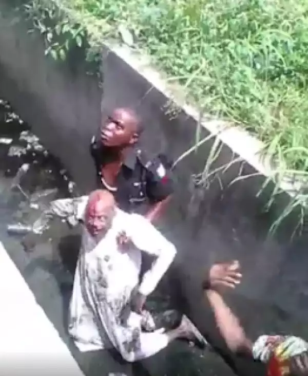 Residents manhandle policeman for pushing man into gutter 